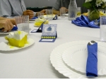 Blue, white and yellow were the main colors for table decorations.